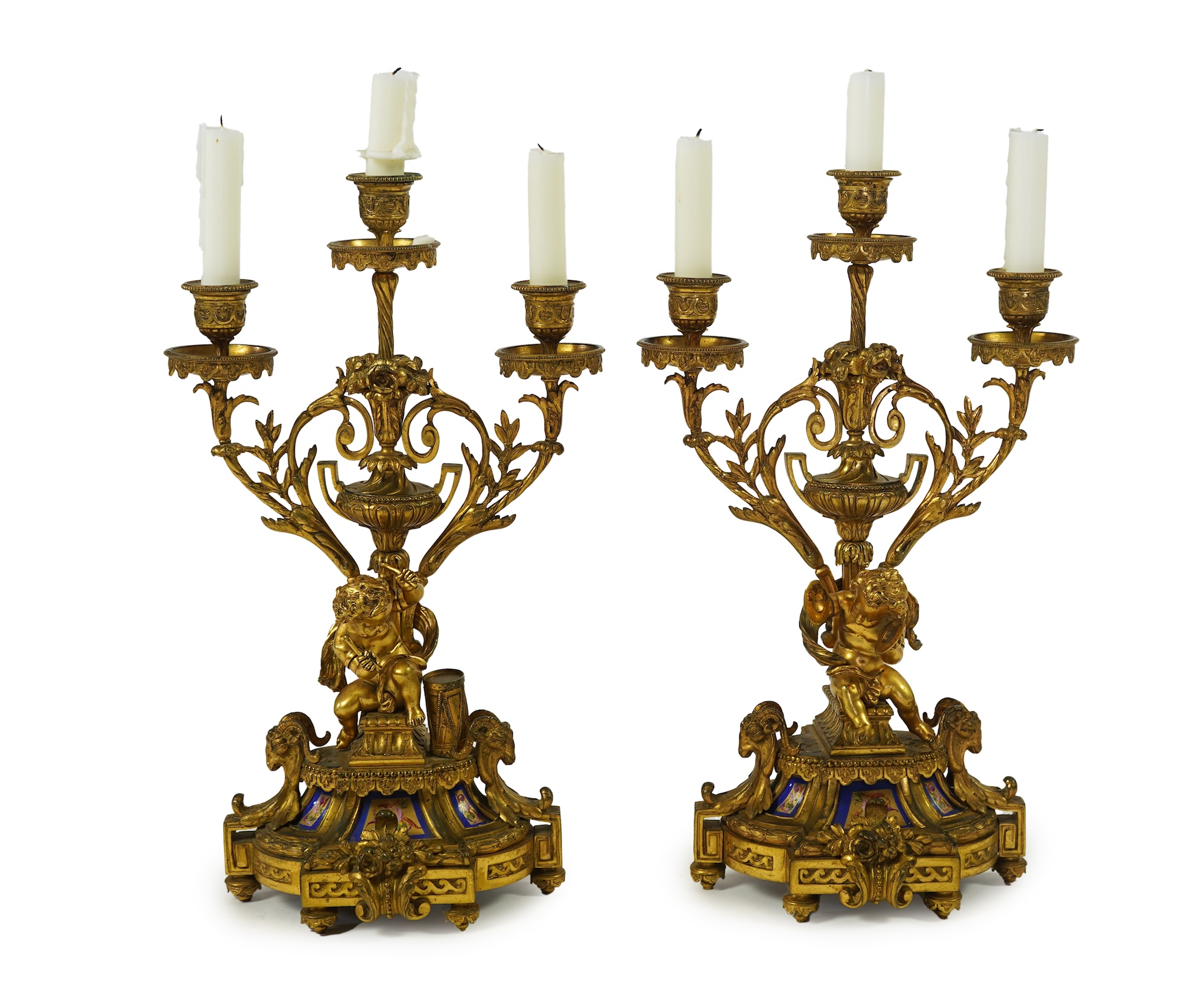 A pair of 19th century French Louis XVI style ormolu three light candelabra